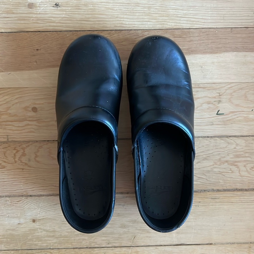 Dansko black leather clogs